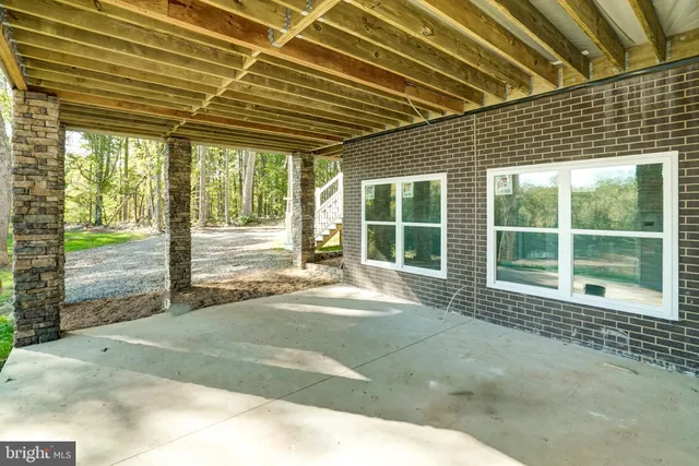 a view of backyard with green space