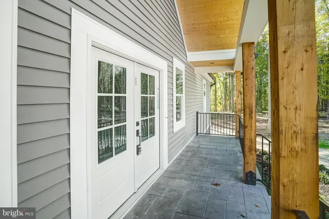 a view of a city from a porch