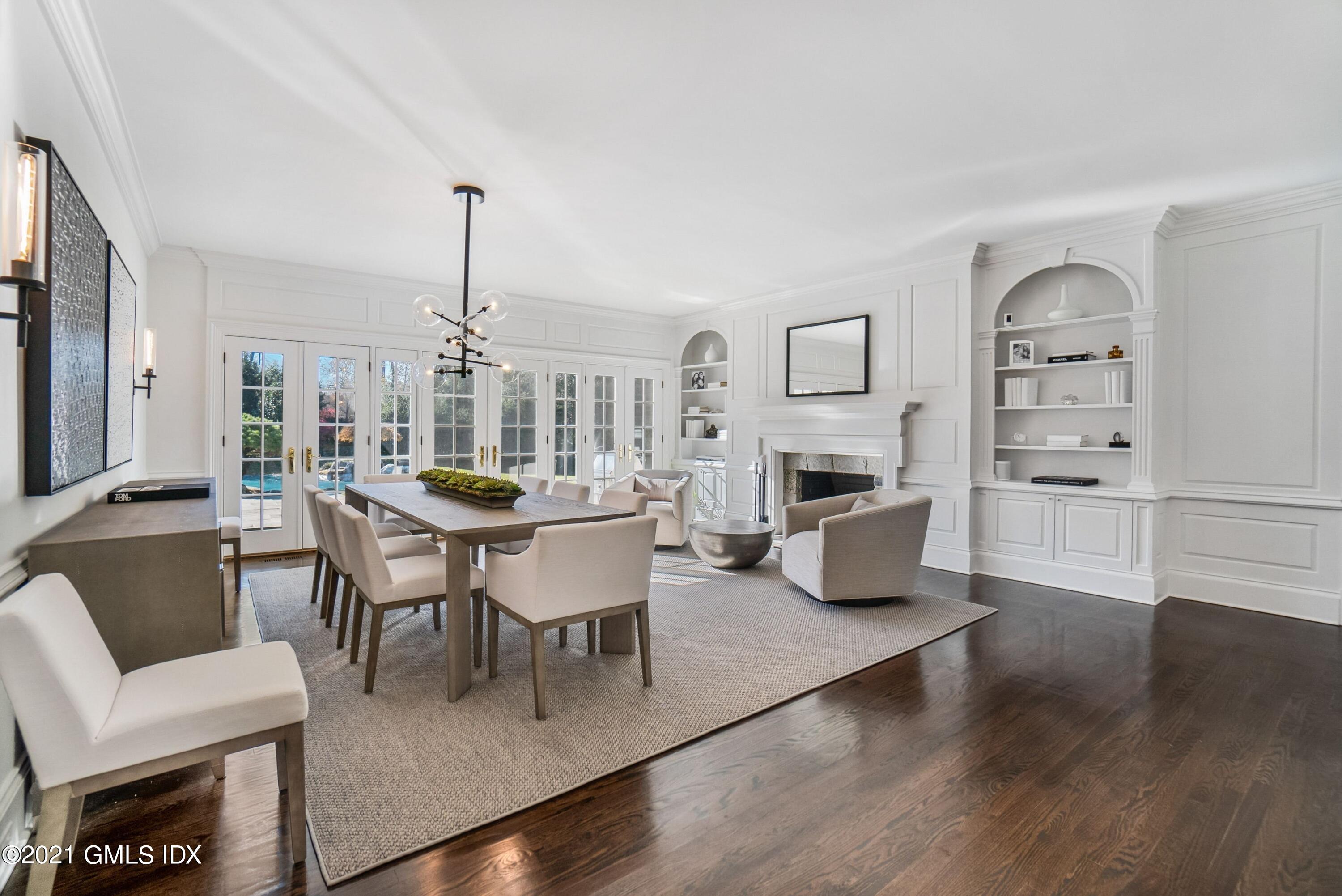 60 Round Hill Road Greenwich, CT 06831 - Photo 19 of 34 a view of a dining room with furniture window and wooden floor