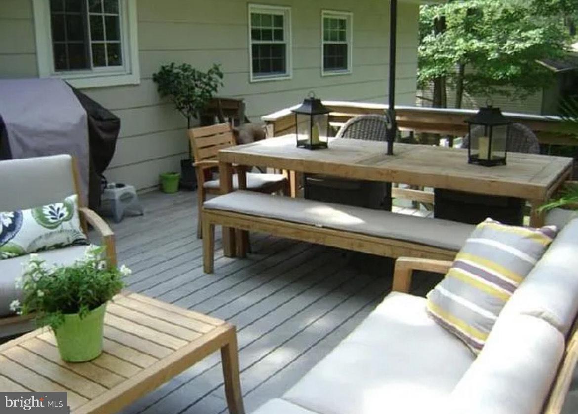 73 Greenvale Road Cherry Hill, NJ 08034 - Photo 13 of 15 a view of a dinning table and chairs in the patio
