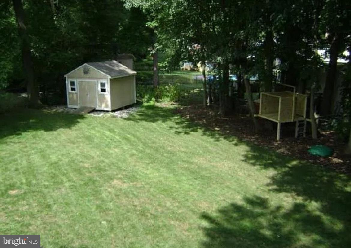 73 Greenvale Road Cherry Hill, NJ 08034 - Photo 14 of 15 a front view of a house with garden