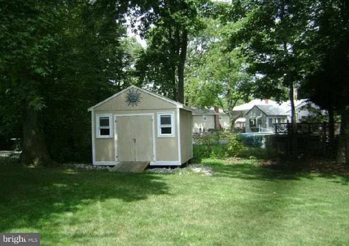 73 Greenvale Road Cherry Hill, NJ 08034 - Photo 15 of 15 a front view of a house with garden