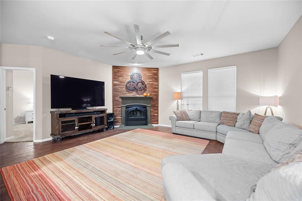 3616 Spring Run Lane Melissa, TX 75454 - Photo 6 of 23 a living room with furniture and a flat screen tv