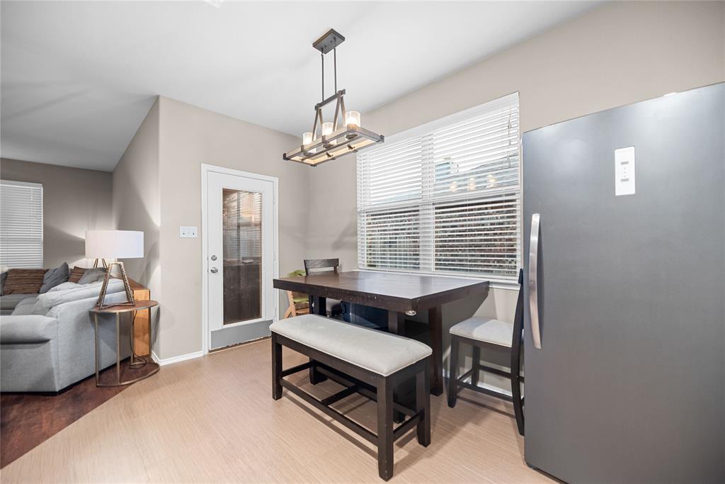 3616 Spring Run Lane Melissa, TX 75454 - Photo 8 of 23 a living room with furniture and a chandelier