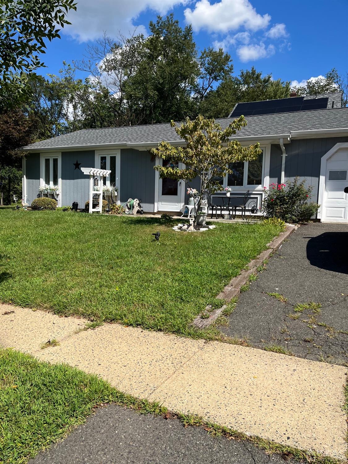 front view of a house with a patio