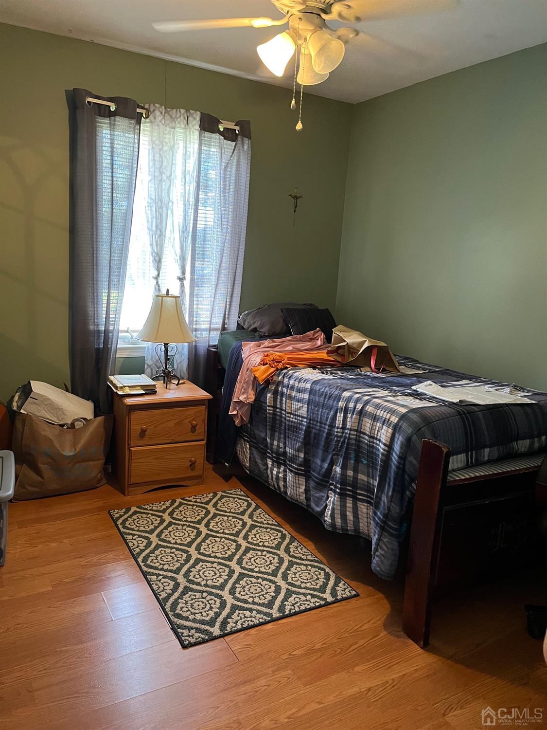1 Brook Hollow Road Piscataway, NJ 08854 - Photo 12 of 18 a bedroom with a bed and window