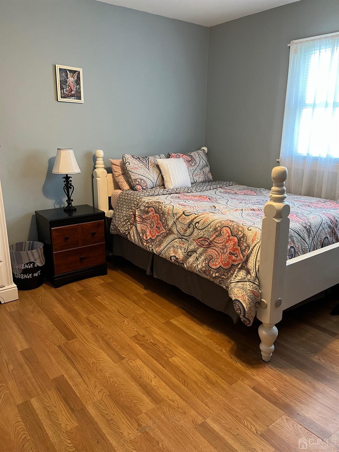 1 Brook Hollow Road Piscataway, NJ 08854 - Photo 14 of 18 a bedroom with a bed and window