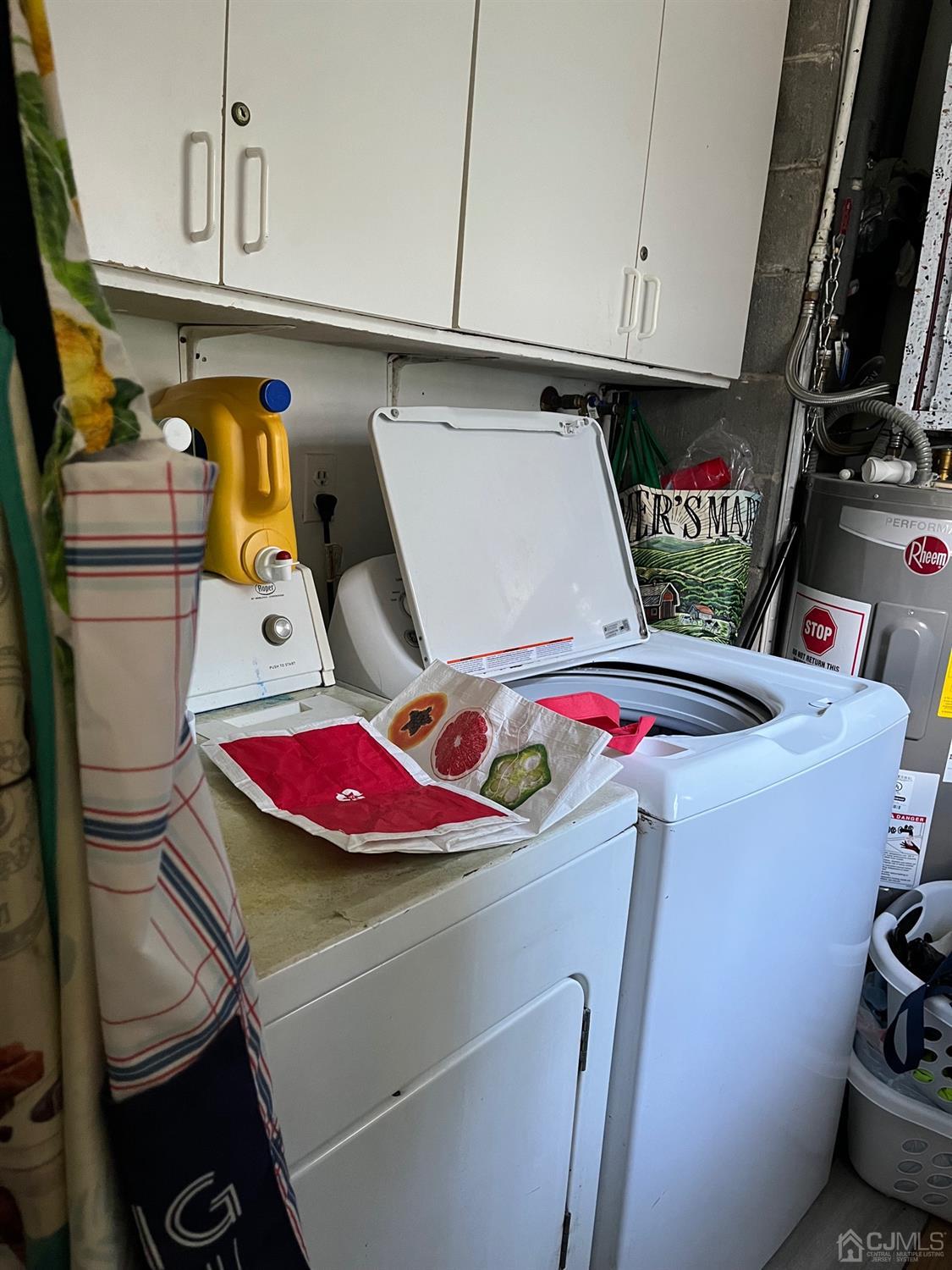 1 Brook Hollow Road Piscataway, NJ 08854 - Photo 5 of 18 a utility room with dryer and washer
