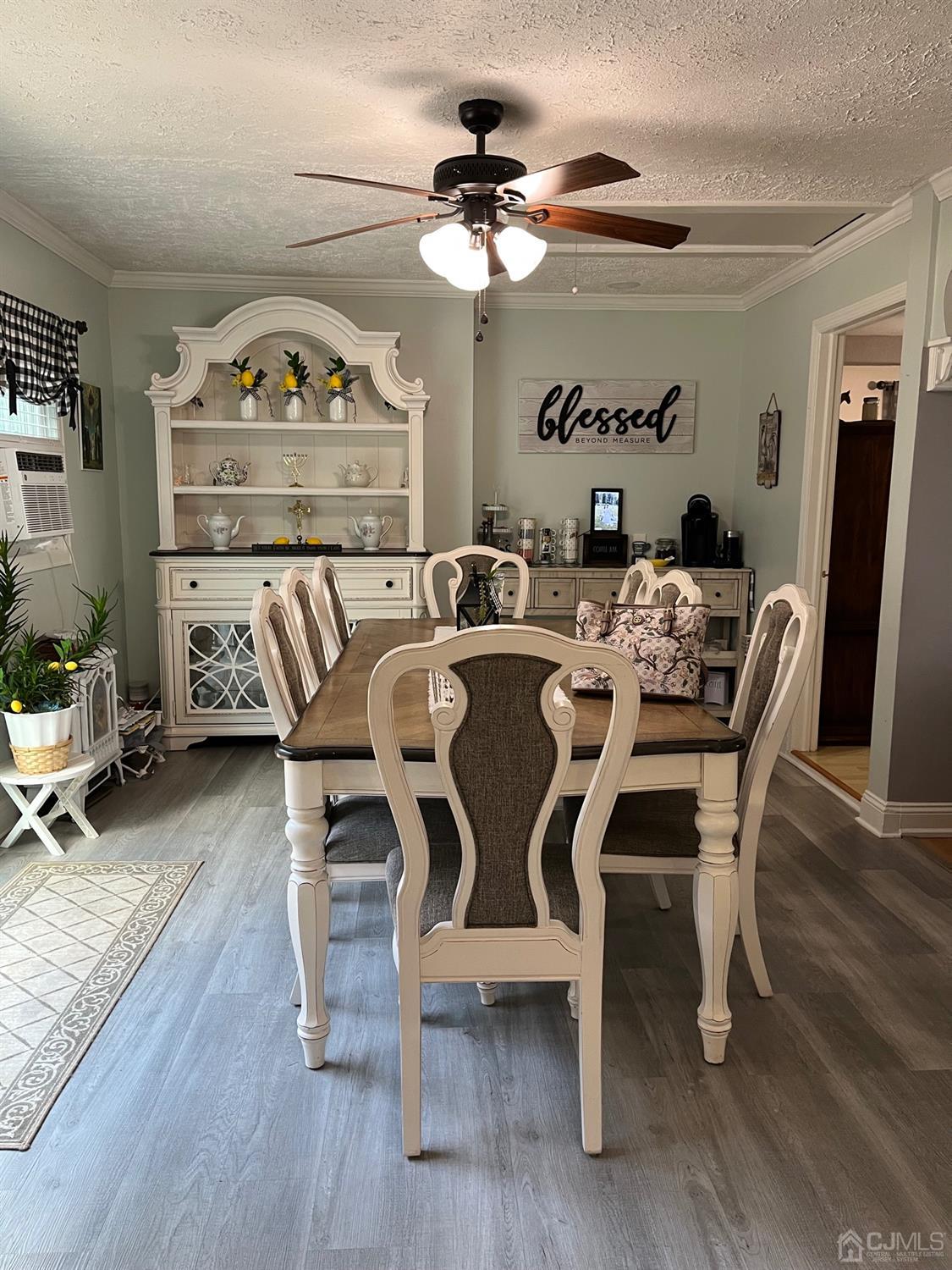 1 Brook Hollow Road Piscataway, NJ 08854 - Photo 6 of 18 a view of a dining room with furniture wooden floor and chandelier