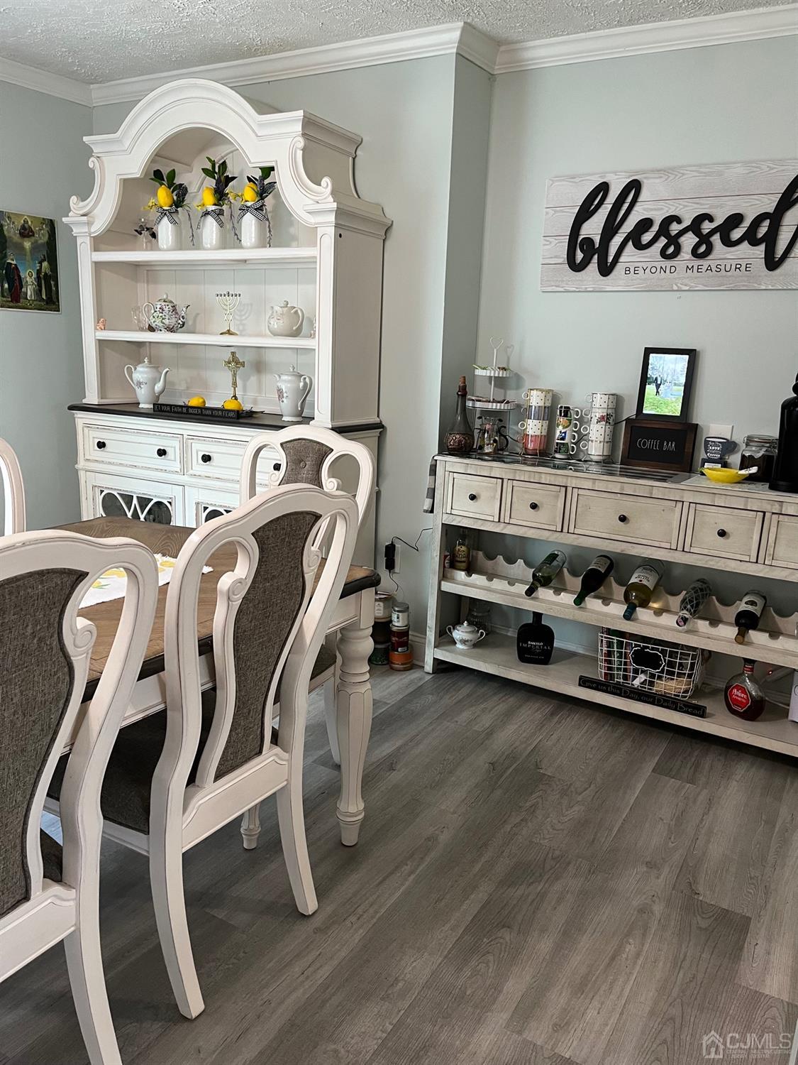 1 Brook Hollow Road Piscataway, NJ 08854 - Photo 7 of 18 a living room with hard wood flooring and a table