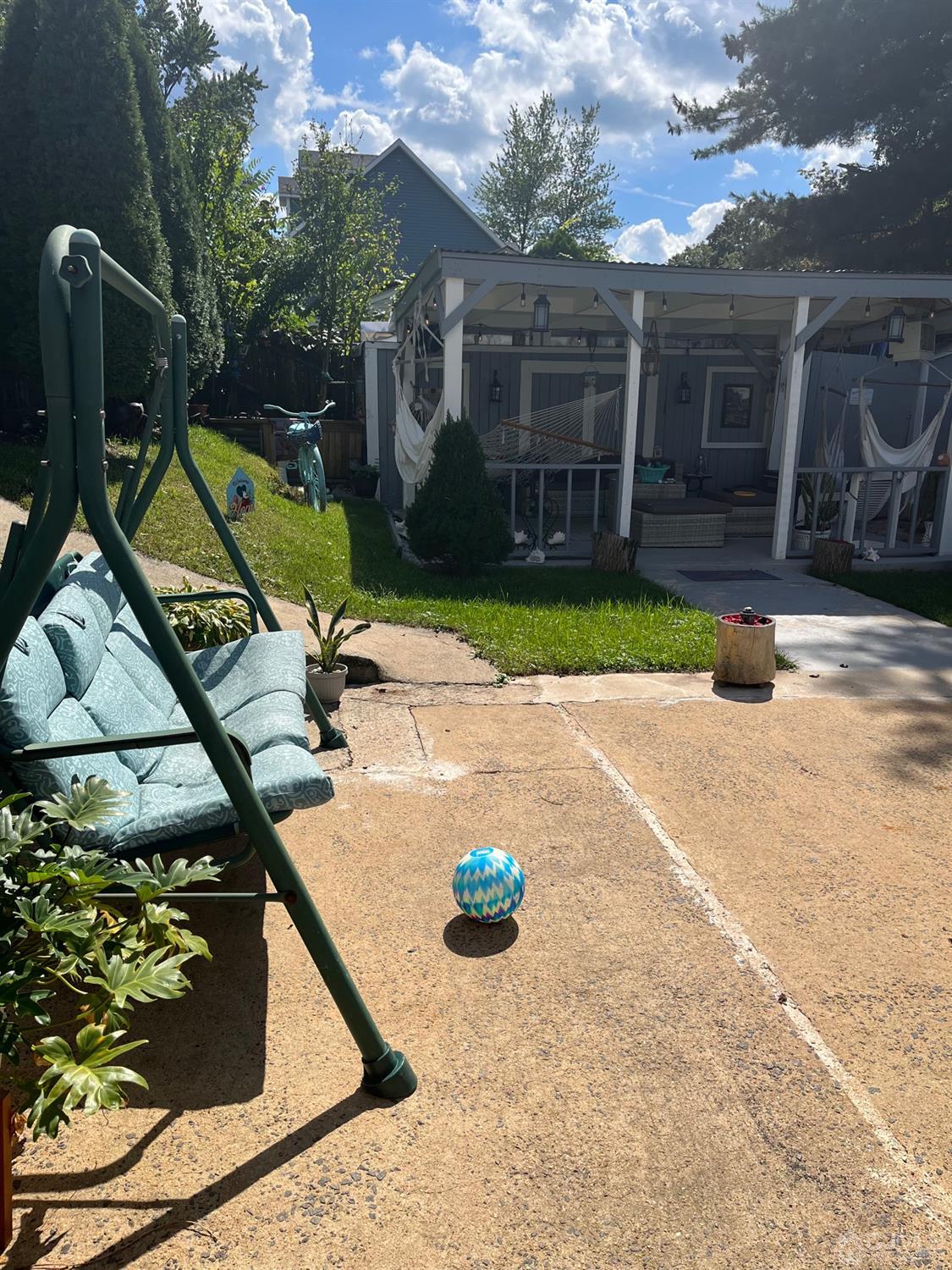 1 Brook Hollow Road Piscataway, NJ 08854 - Photo 10 of 18 a view of a chair and tables in the patio