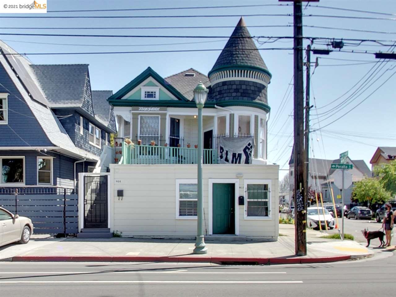 a view of a brick house with large windows
