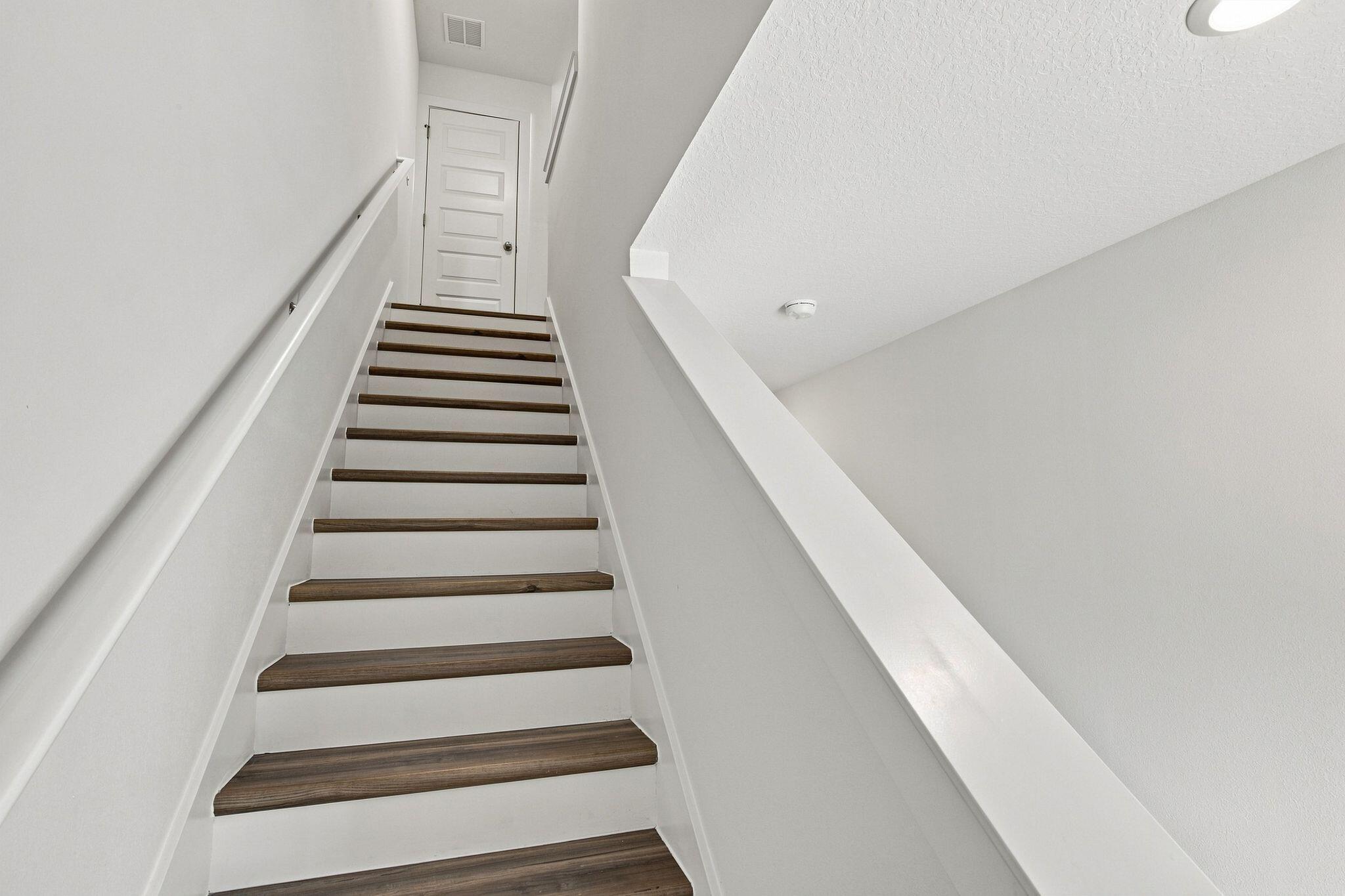 157 Hawk Street Santa Rosa Beach, FL 32459 - Photo 15 of 38 Wood tread staircase