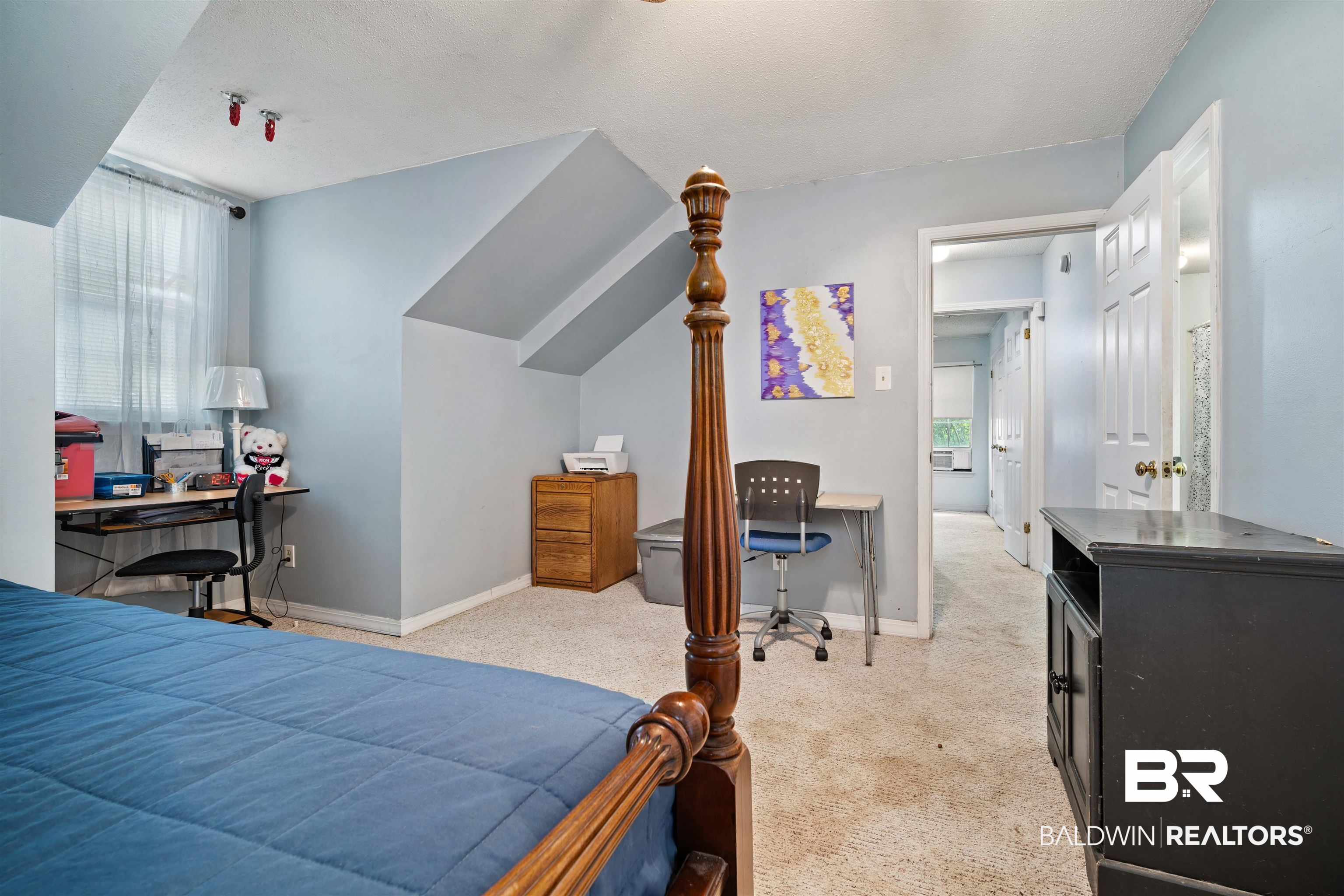2823 Woodland Road Mobile, AL 36693 - Photo 21 of 29 Bedroom with light colored carpet and baseboards