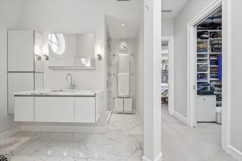 a bathroom with a sink and a mirror