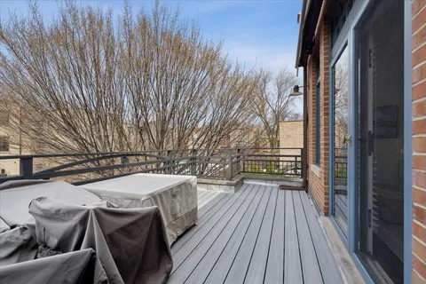 a view of backyard with hardwood