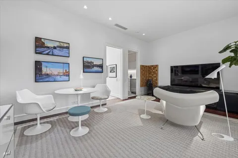 a living room with furniture and a table
