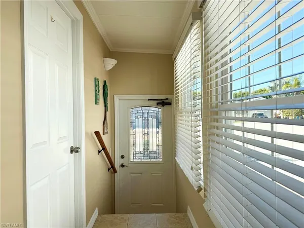 a view of a balcony with wooden floor