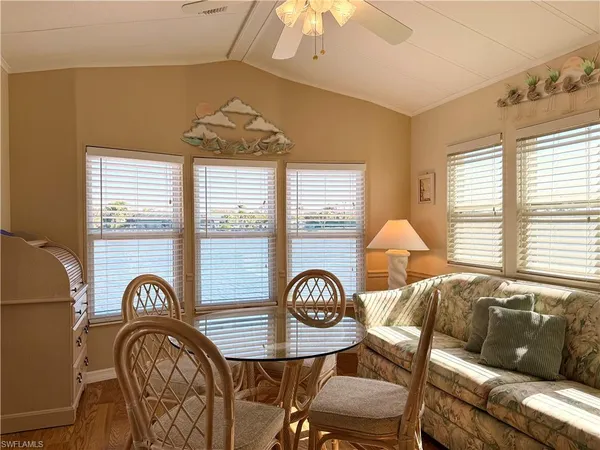 a view of a livingroom with furniture and entryway