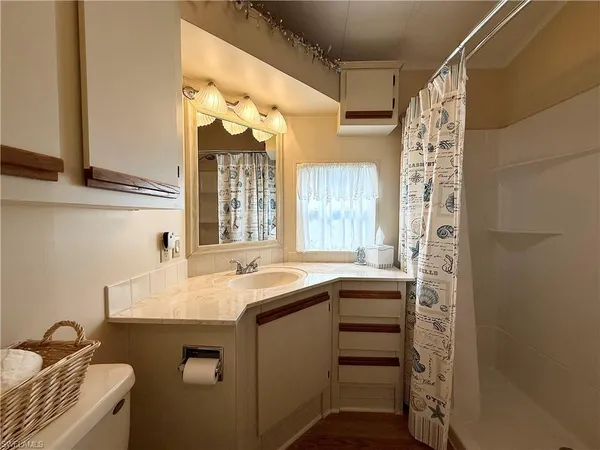 a kitchen with a sink and a window