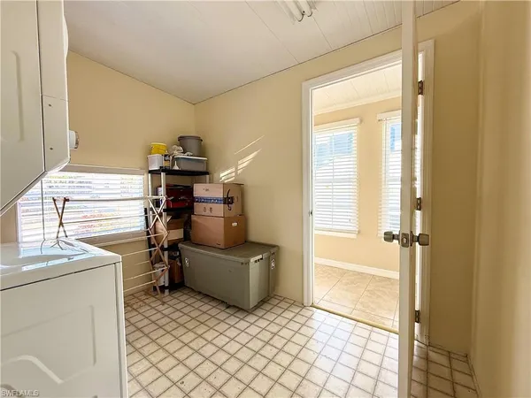 a view of kitchen and utility room