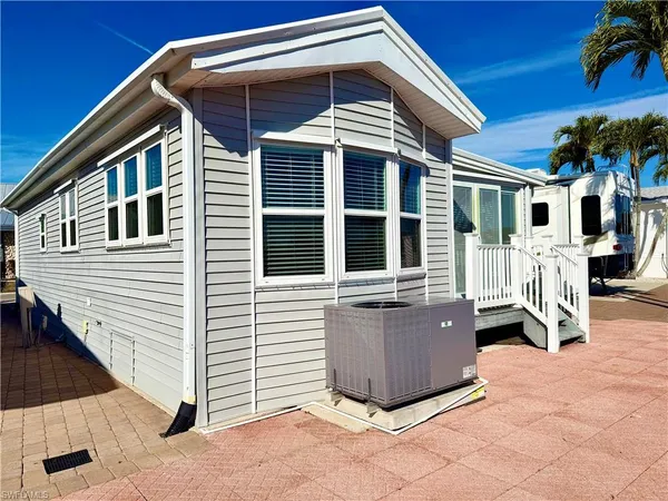 a front view of a house with a porch