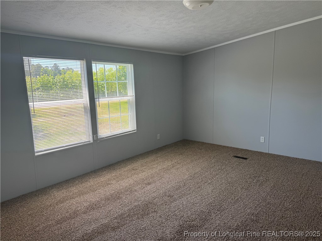 2273 Bee Gee Road Lumberton, NC 28358 - Photo 16 of 35 an empty room with a window