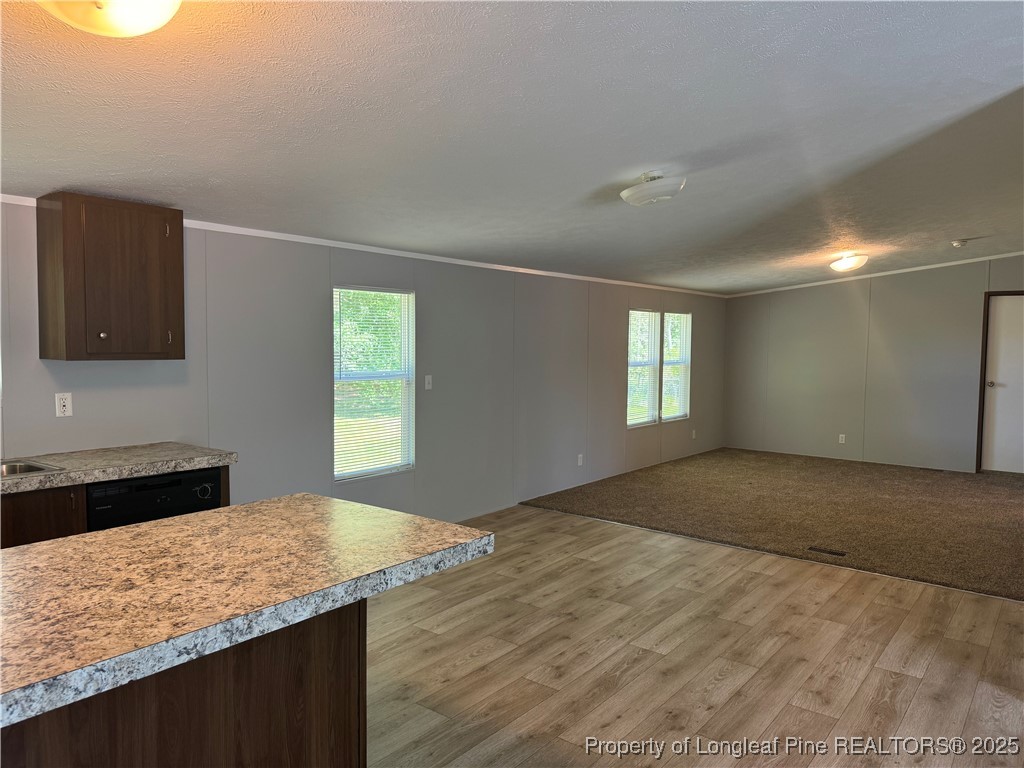 2273 Bee Gee Road Lumberton, NC 28358 - Photo 23 of 35 a kitchen with a stove and a sink
