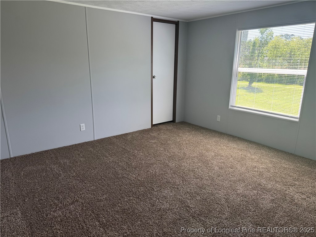 2273 Bee Gee Road Lumberton, NC 28358 - Photo 25 of 35 a view of an empty room with a window