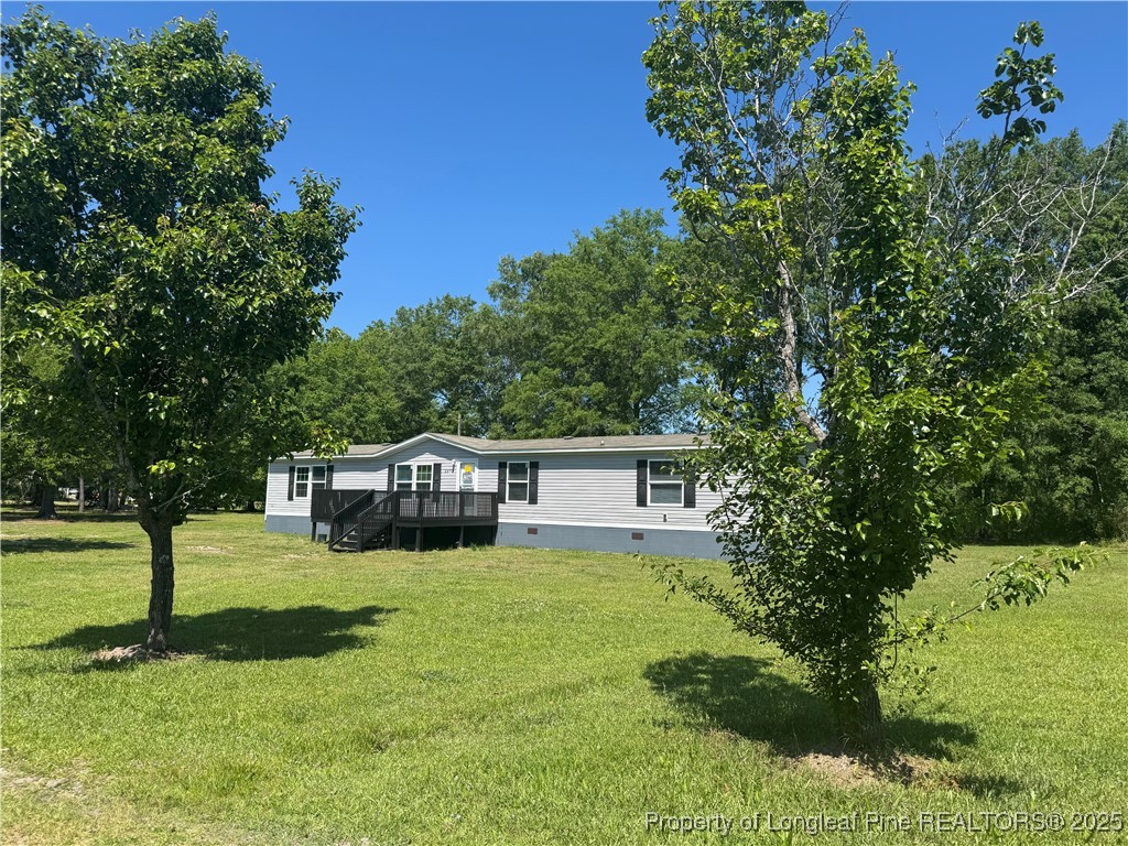 2273 Bee Gee Road Lumberton, NC 28358 - Photo 3 of 35 a house view with a garden space