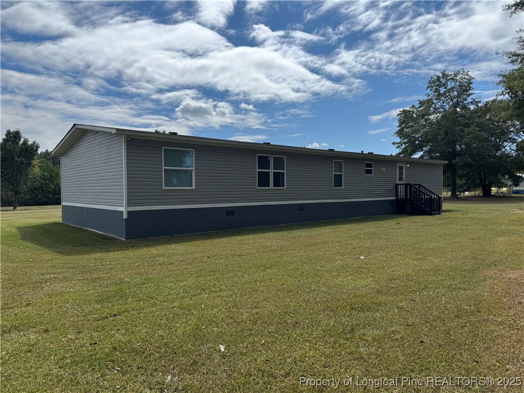 2273 Bee Gee Road Lumberton, NC 28358 - Photo 33 of 35 a view of an outdoor space and yard