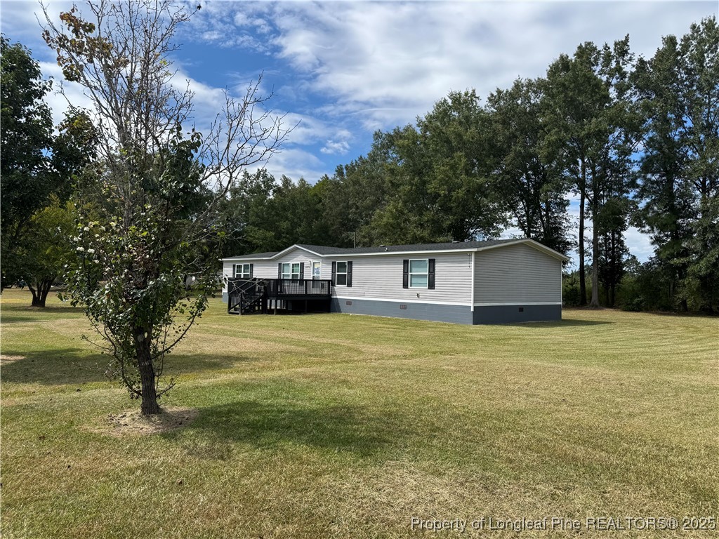 2273 Bee Gee Road Lumberton, NC 28358 - Photo 6 of 35 a house view with a outdoor space