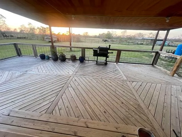 a view of a house with a yard patio and sitting area