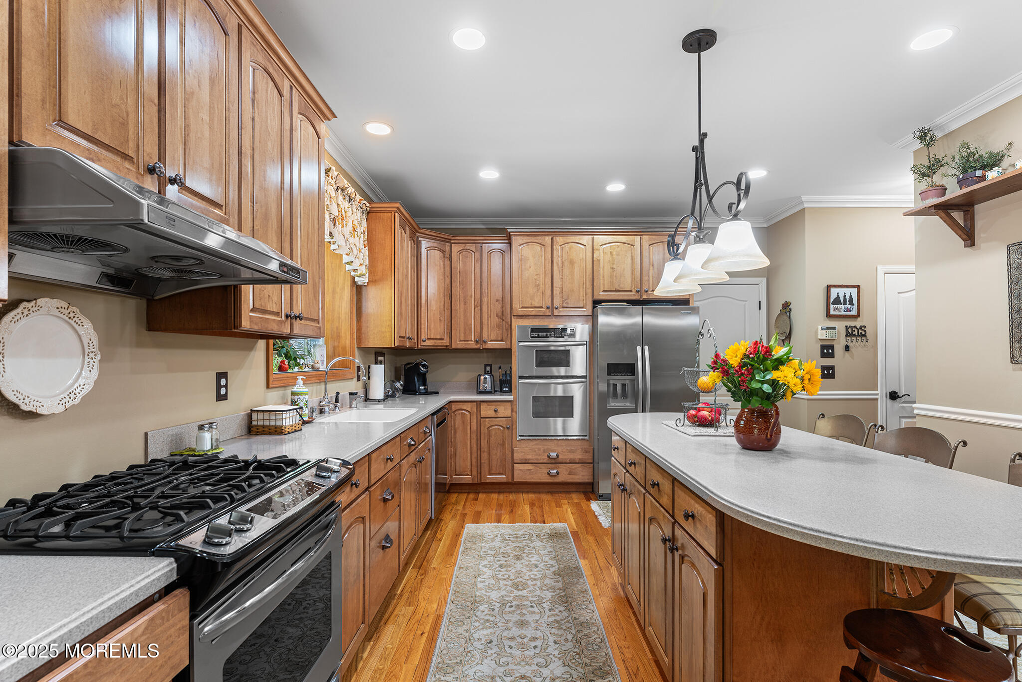 109 Merrick Road Farmingdale, NJ 07727 - Photo 17 of 62 a kitchen with lots of counter top space