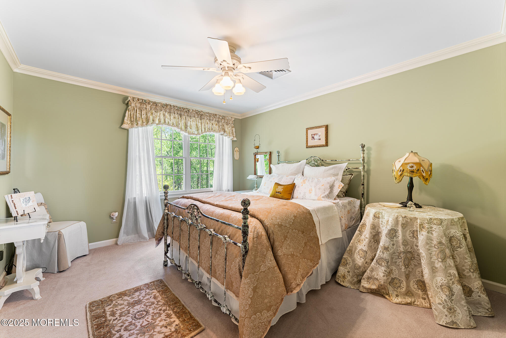 109 Merrick Road Farmingdale, NJ 07727 - Photo 29 of 62 a bed room with a bed and a chandelier