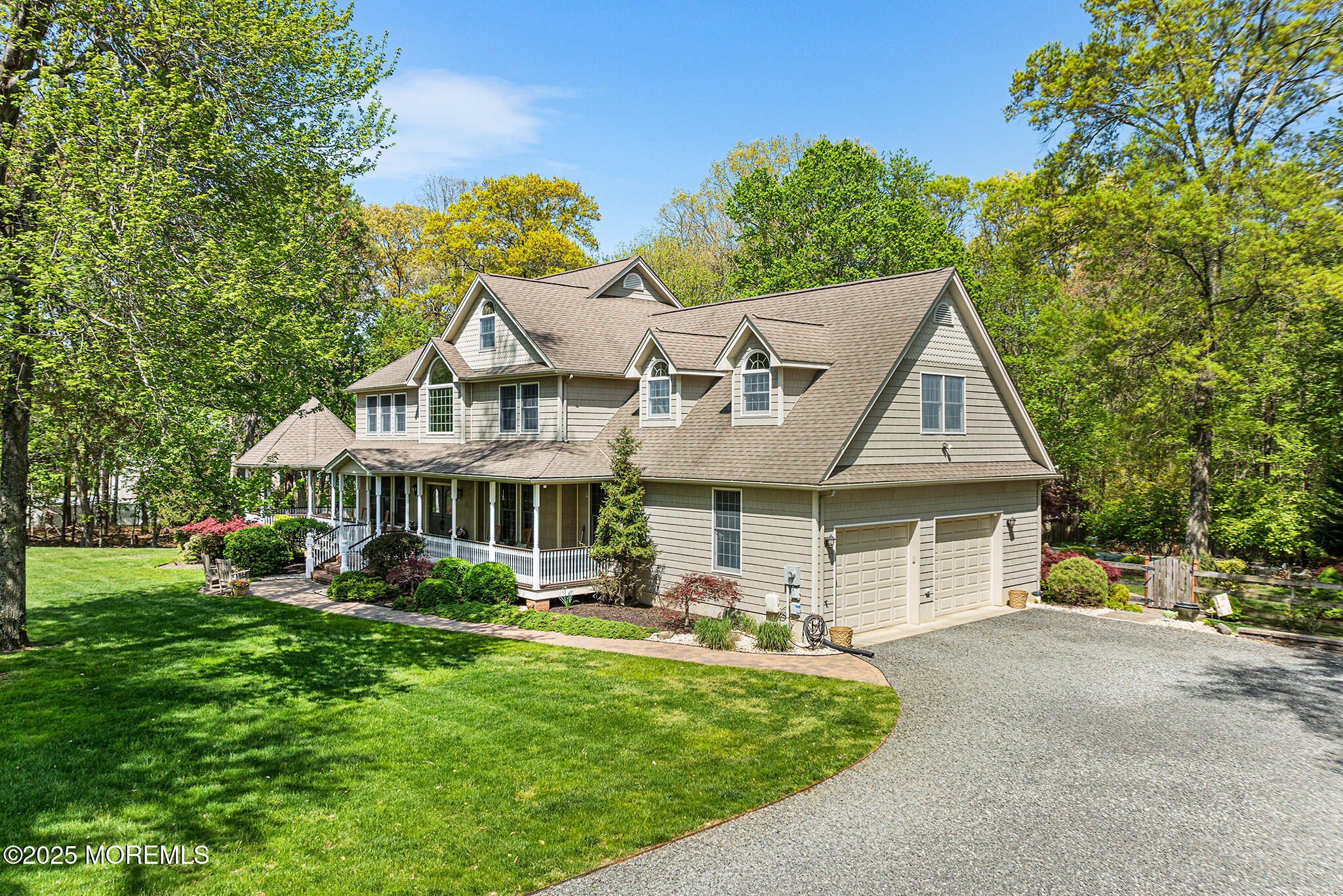 109 Merrick Road Farmingdale, NJ 07727 - Photo 3 of 62 a front view of a house with garden