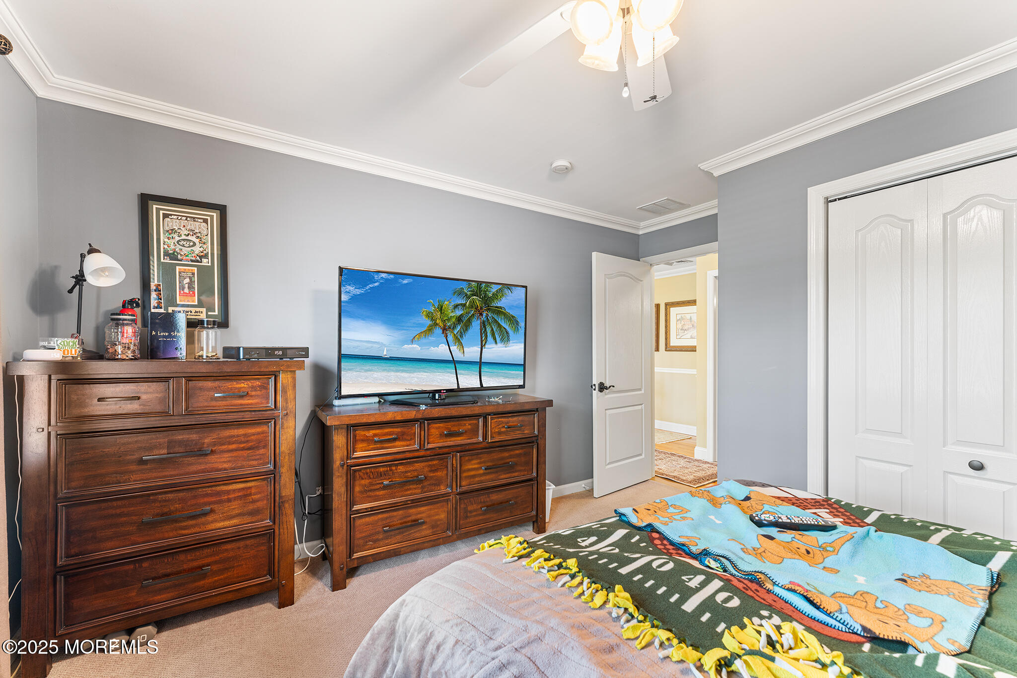 109 Merrick Road Farmingdale, NJ 07727 - Photo 33 of 62 a bedroom with a bed and furniture
