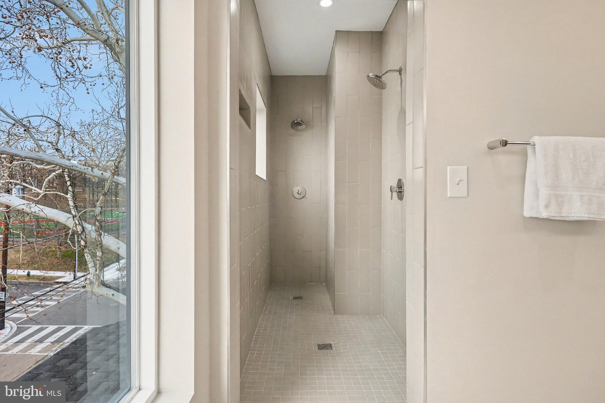 842 Madison Street Northwest, Unit 2 Washington, DC 20011 - Photo 11 of 27 a bathroom with a shower