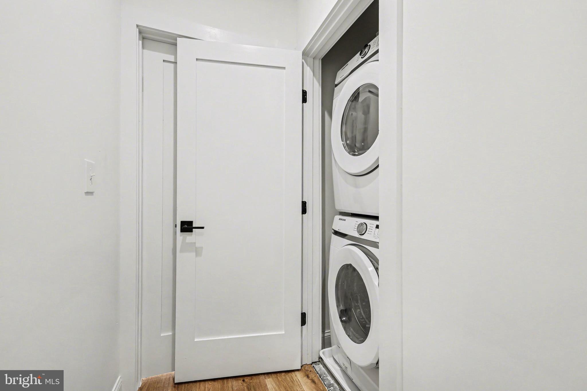 842 Madison Street Northwest, Unit 2 Washington, DC 20011 - Photo 15 of 27 a utility room with dryer and washer
