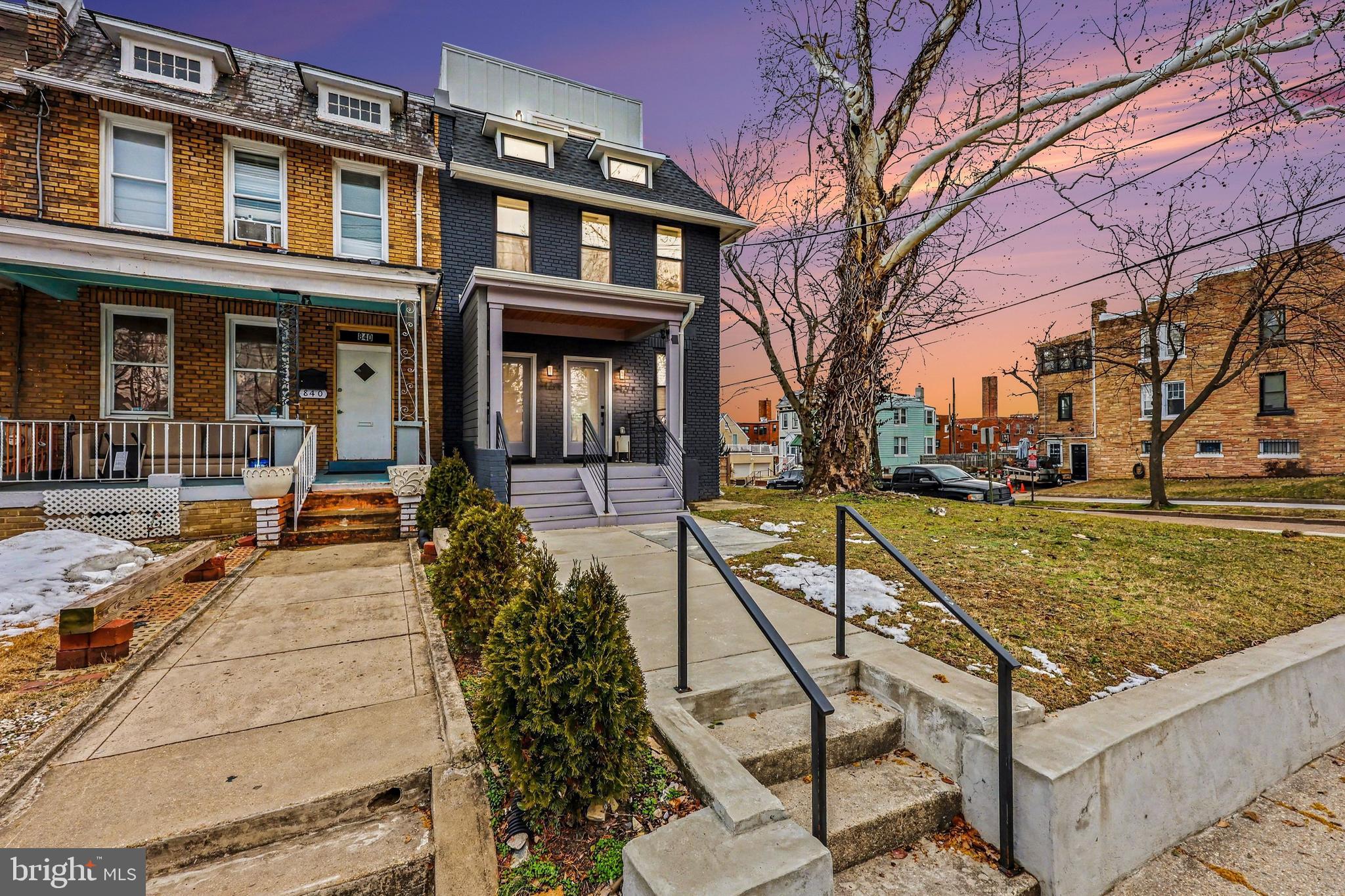 842 Madison Street Northwest, Unit 2 Washington, DC 20011 - Photo 23 of 27 a view of a house with backyard