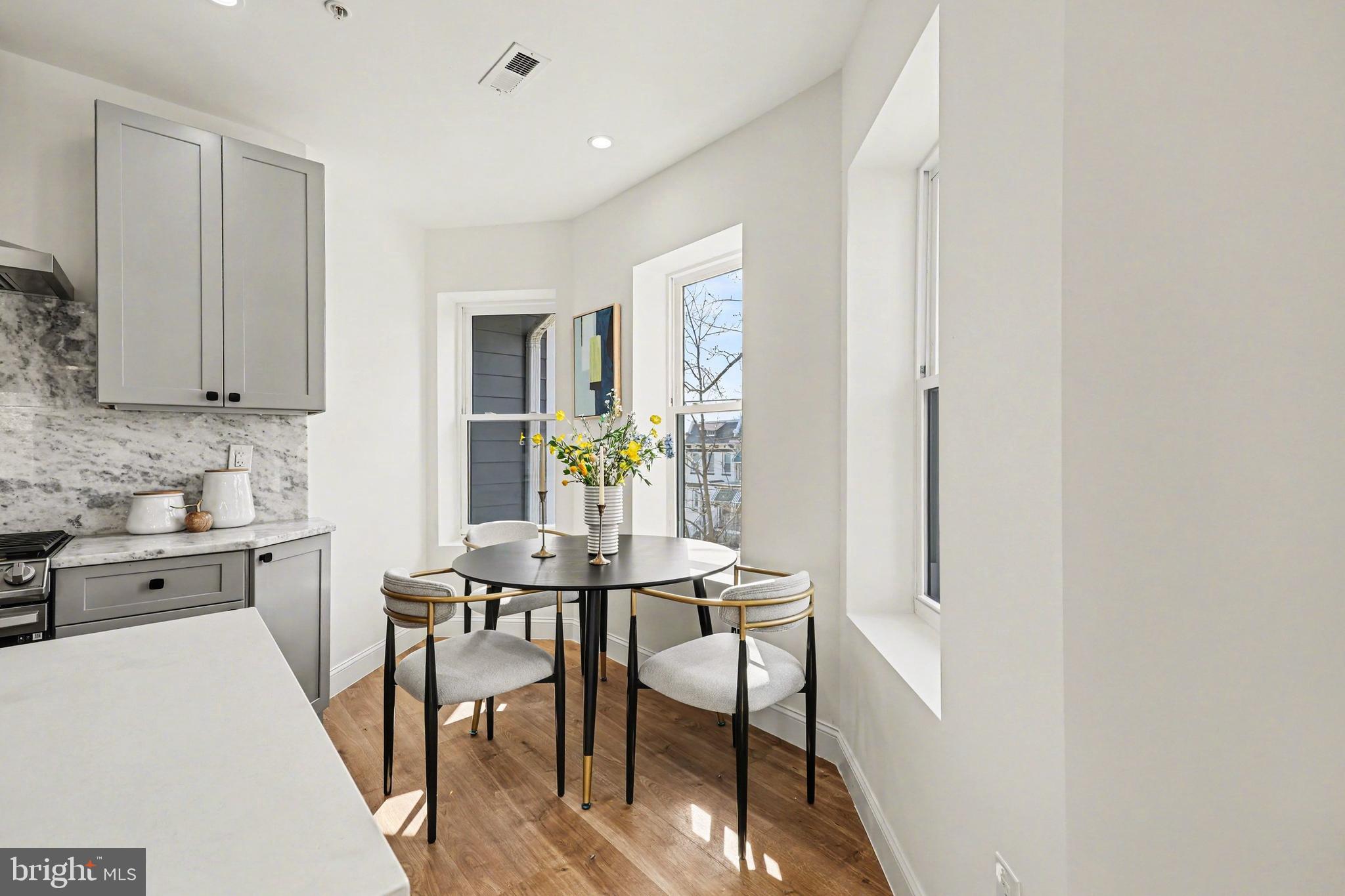 842 Madison Street Northwest, Unit 2 Washington, DC 20011 - Photo 7 of 27 a view of a dining room with furniture