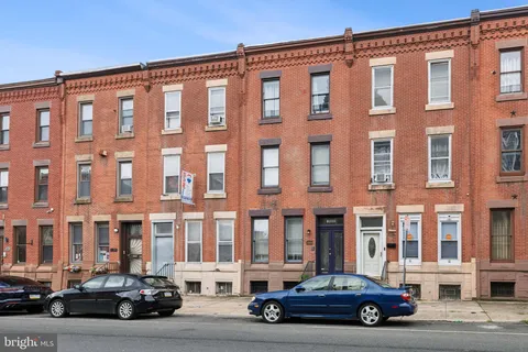 a car parked in front of a building