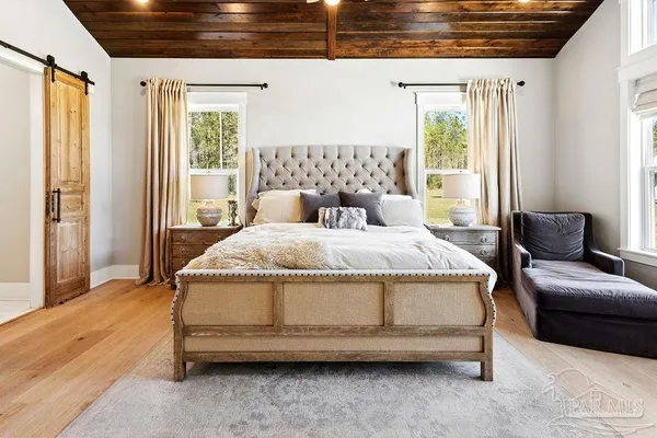a spacious bathroom with a double vanity sink mirror and