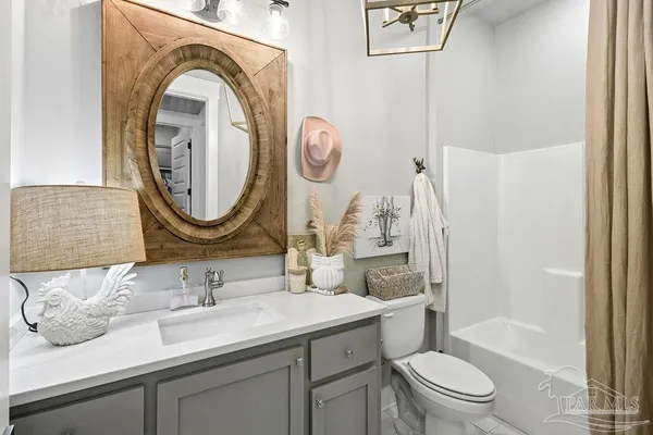 a kitchen with stainless steel appliances a stove and a sink