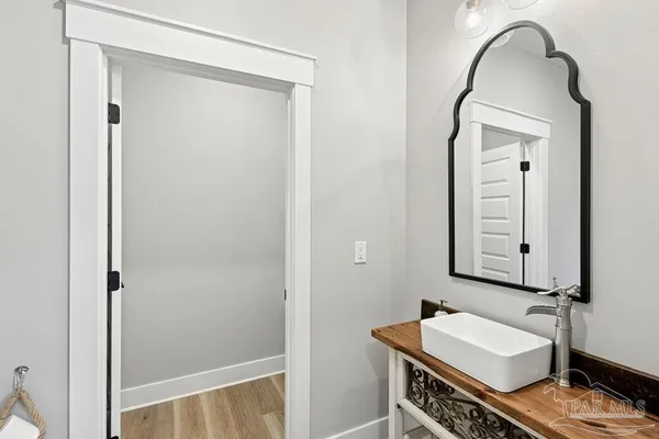 a front view of a house with large windows