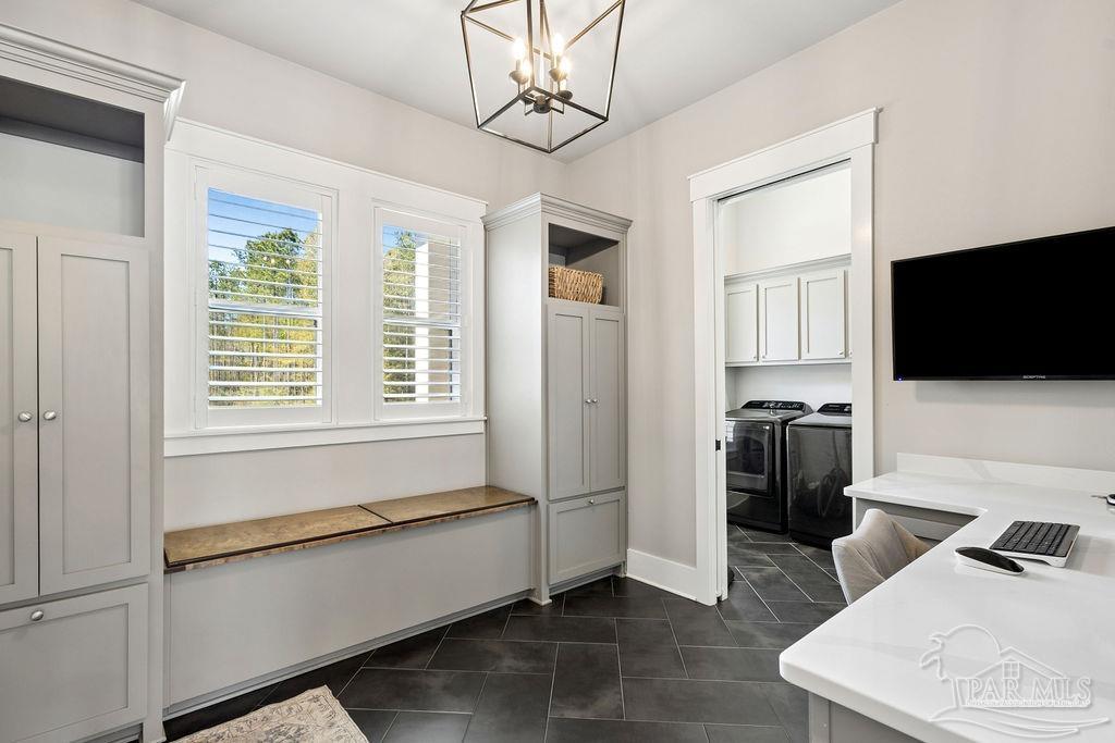 7520 Hidden Forest Trail Pace, FL 32571 - Photo 46 of 65 a spacious bedroom with a bed and a flat screen tv
