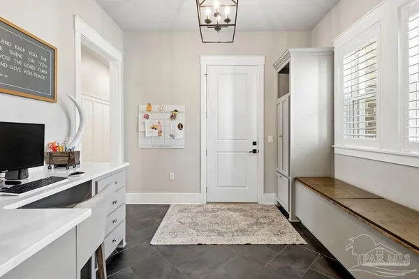 a view of a big yard with large trees