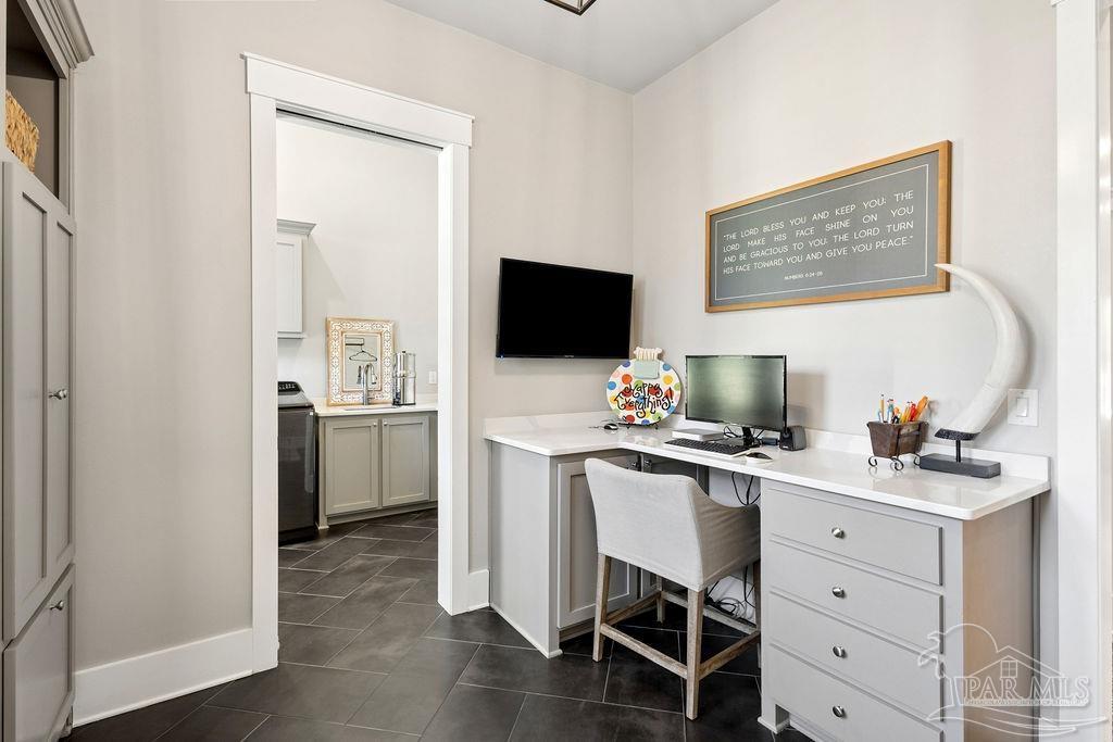7520 Hidden Forest Trail Pace, FL 32571 - Photo 48 of 65 a view of a workspace with furniture and a flat screen tv