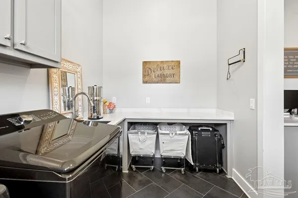 a front view of a house with a big yard