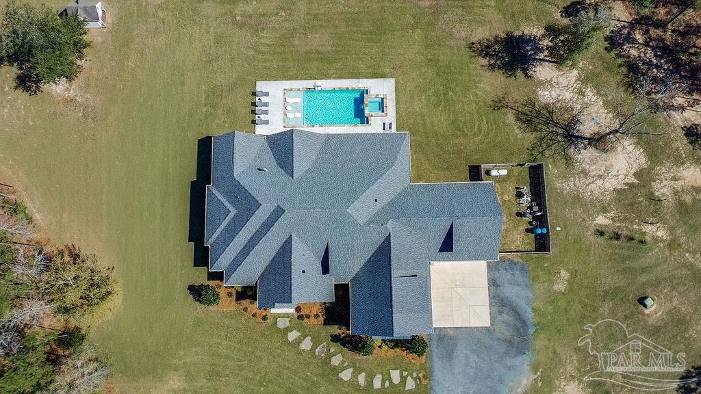 7520 Hidden Forest Trail Pace, FL 32571 - Photo 64 of 65 an aerial view of residential houses with outdoor space